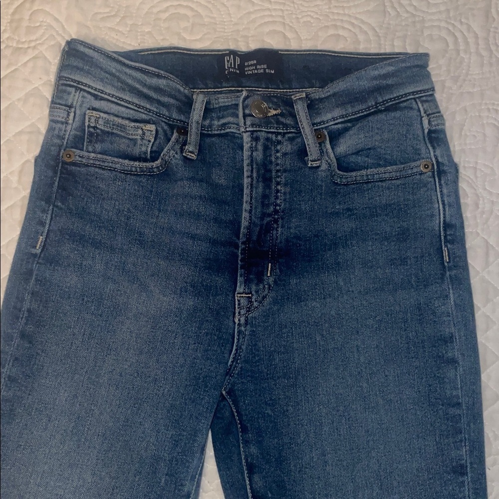 GAP Denim High Rise Vintage Slim Jeans - Blue. Size 0. Rough hem.